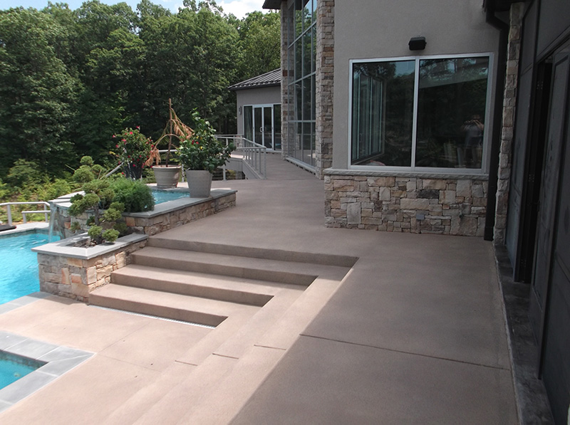 A Frederick County, VA home with a brand new concrete overlay pool deck.